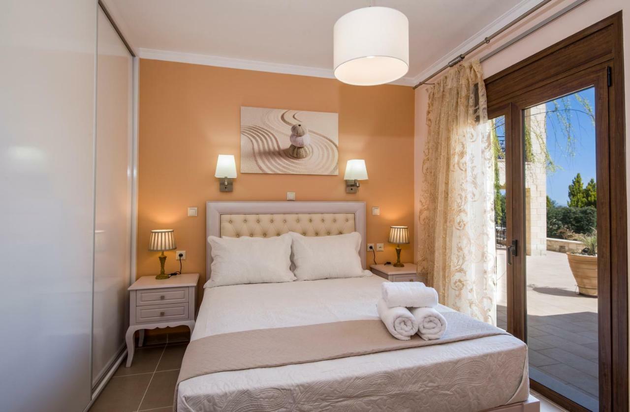 Casa Leone Suites Сталос Экстерьер фото