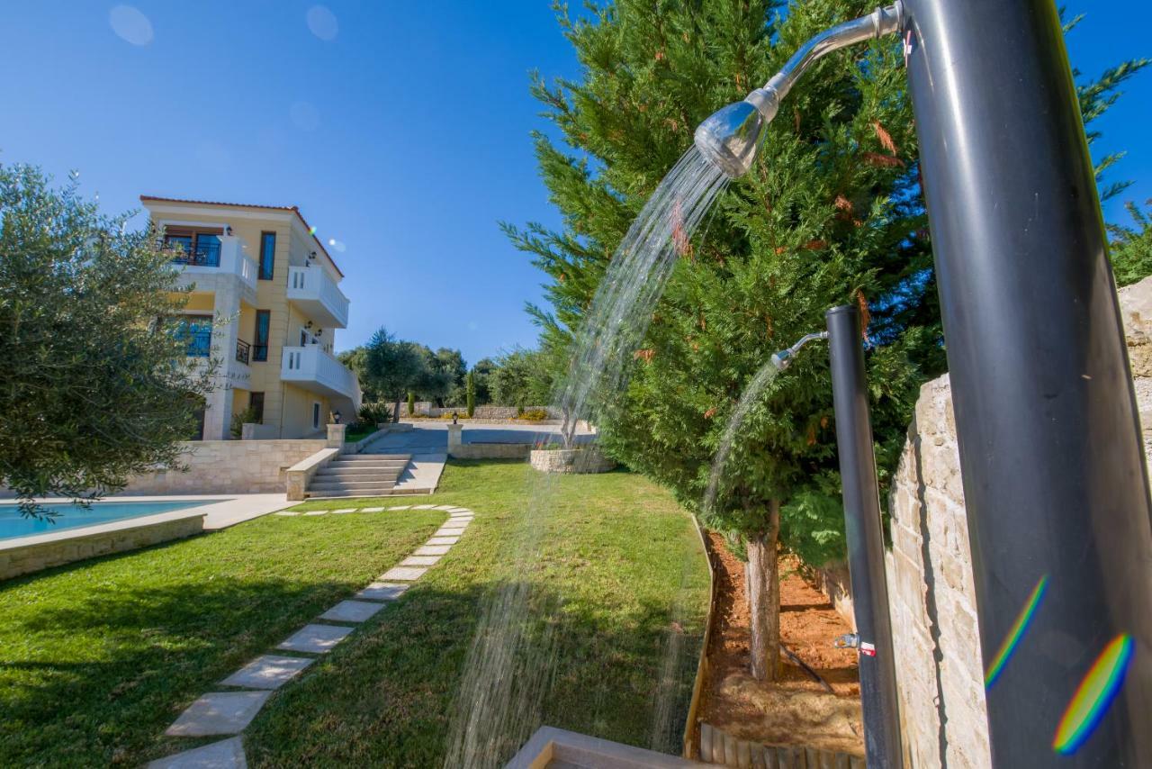 Casa Leone Suites Сталос Экстерьер фото
