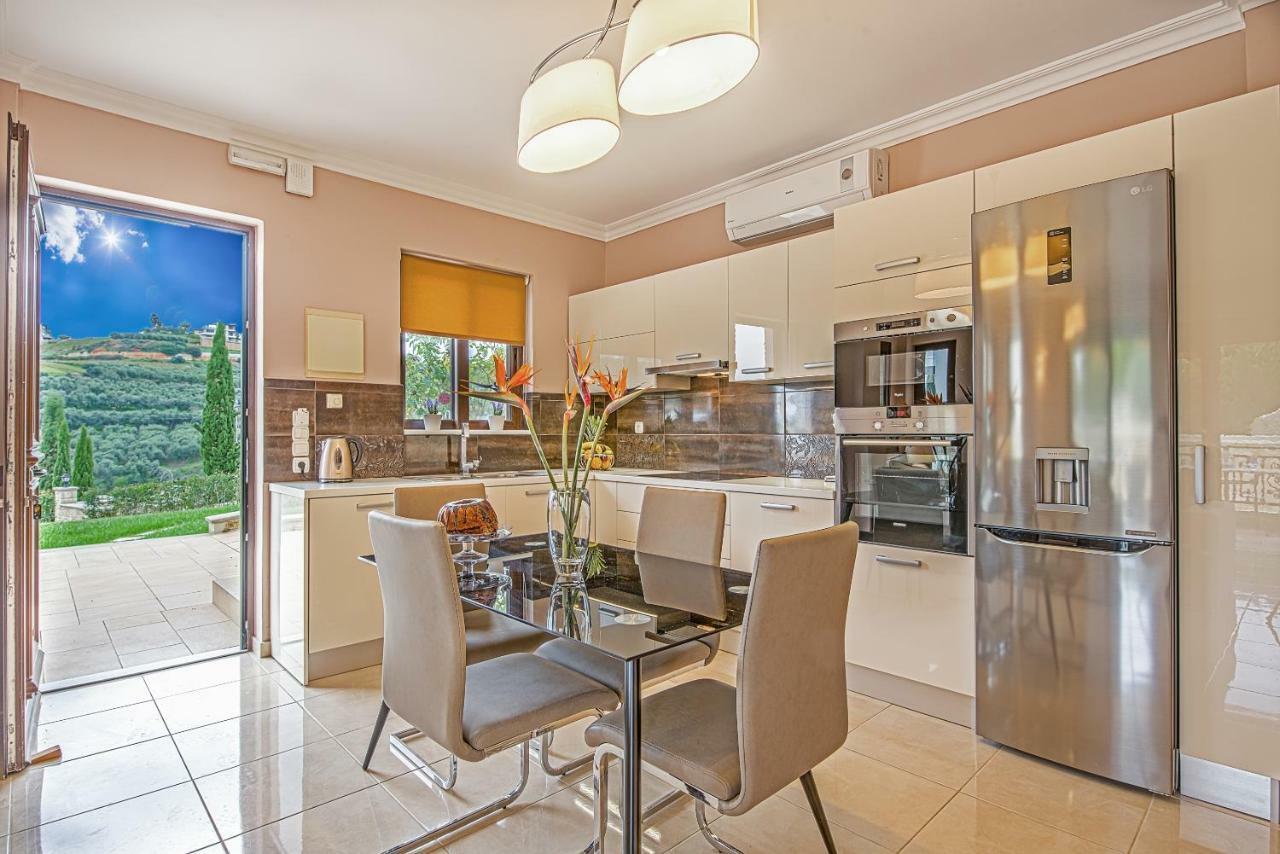 Casa Leone Suites Сталос Экстерьер фото