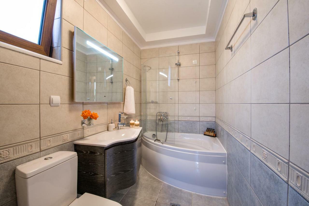 Casa Leone Suites Сталос Экстерьер фото